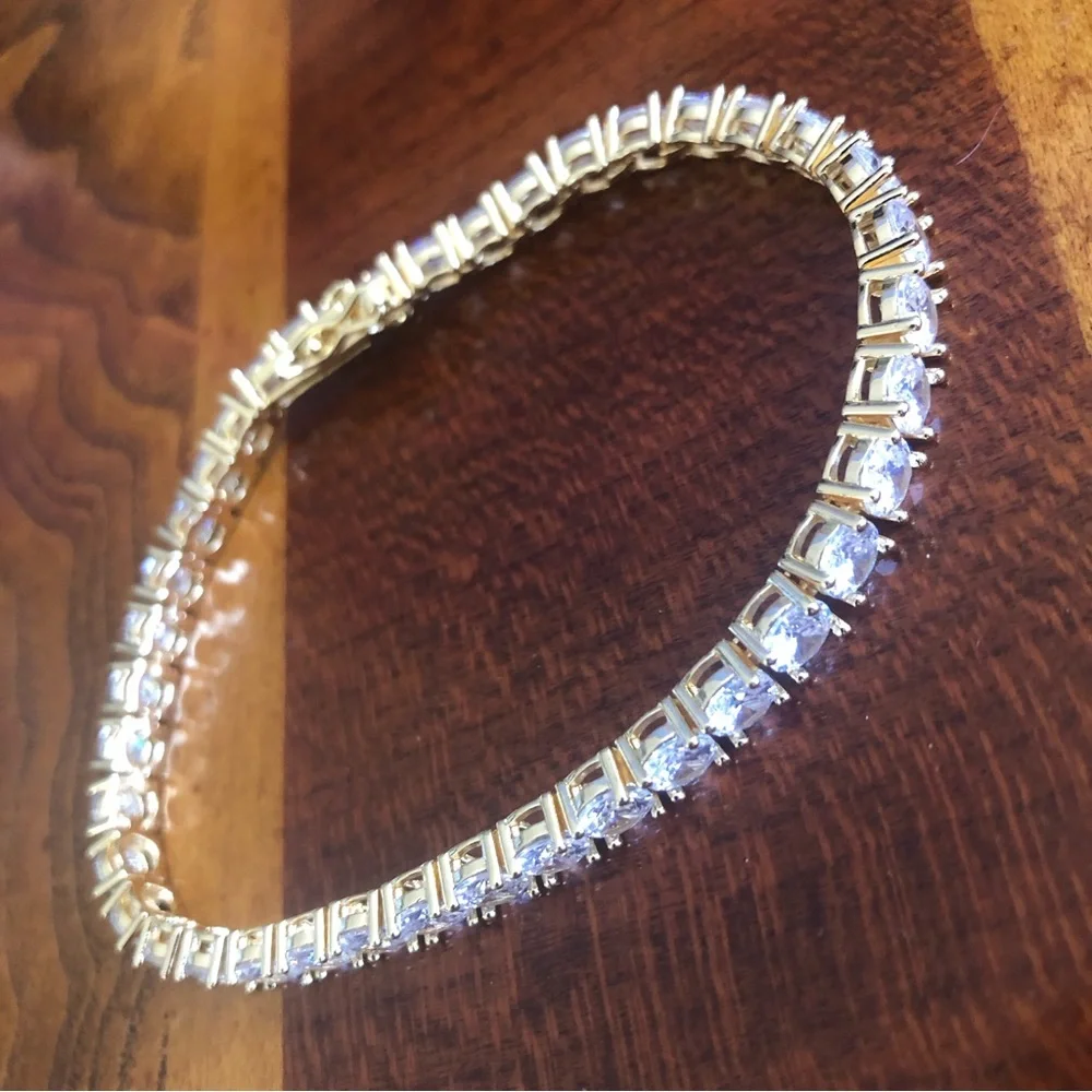 Men’s 5mm round cubic zirconia 14k gold plated setting bracelet 8”
